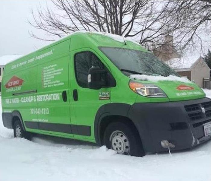 green truck on snow